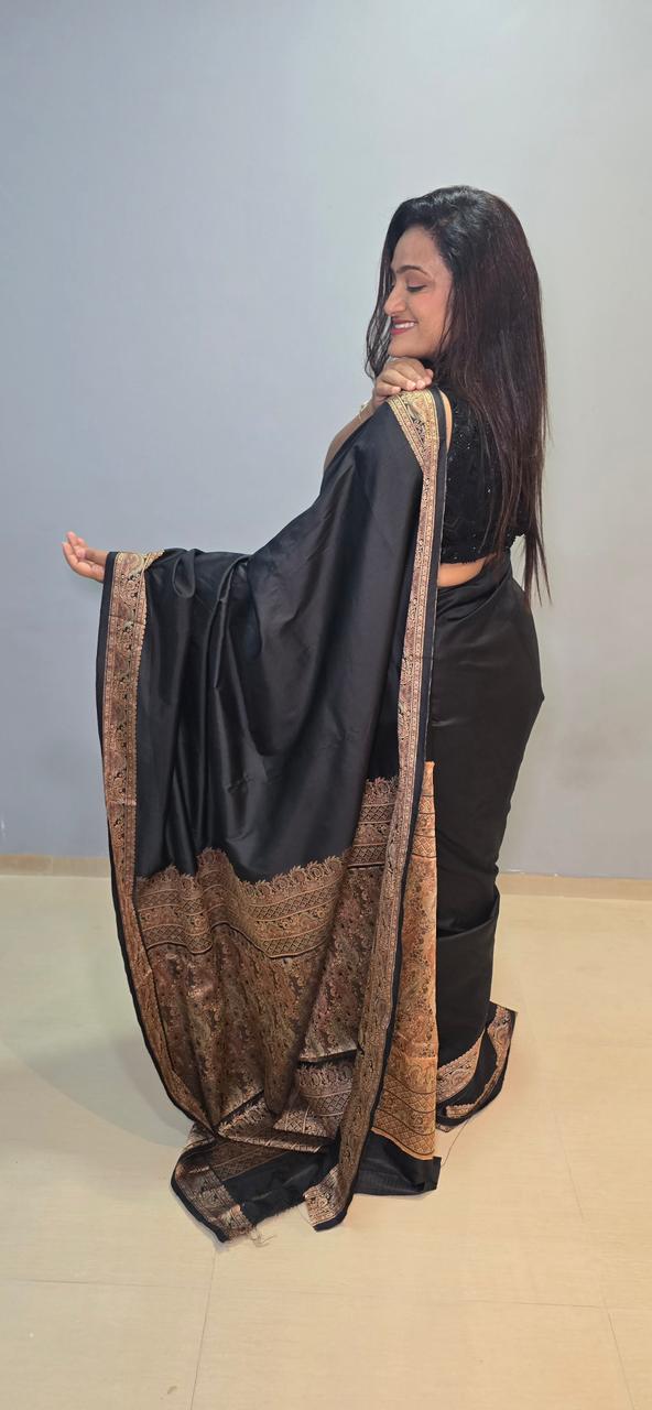 Back view of the black silk sari with gold border